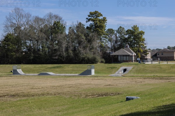 Outdoor skate park in Cypress Creek Park at Timber Lane in Spring, Texas, USA