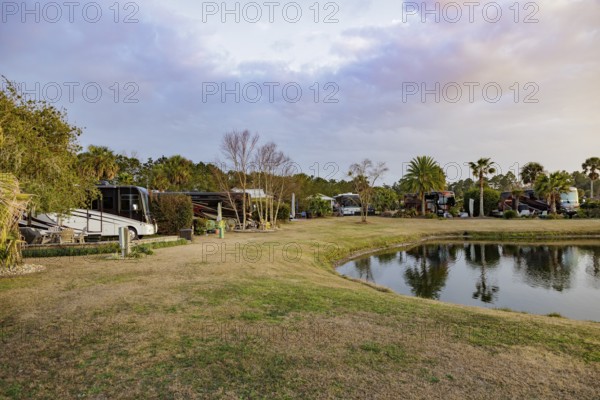 Motorhomes with waterfront lots at RV Resort in southern Alabama, USA