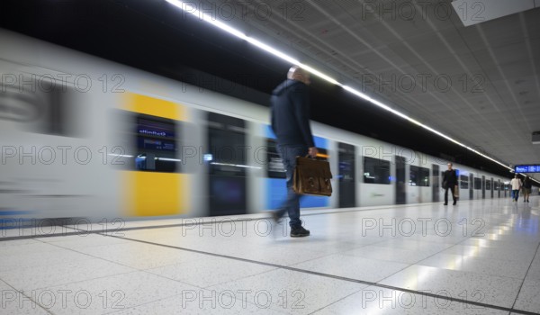 Underground suburban train, train, Generation 2025, platform, stop, Stadtmitte station, public transport, movement effect, passengers, travellers, briefcase, VVS, Stuttgart Transport Association, Baden-Württemberg, Germany