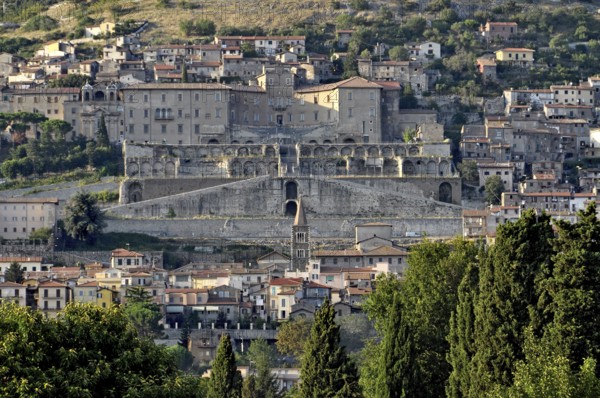 Baroque palace Palazzo Colonna Barberini above terraces of the temple complex, ruins of the sanctuary and oracle of the goddess Fortuna Primigenia, Tempio della Fortuna Primigenia, Area Sacra, Roman antiquity, evening light, Palestrina, metropolitan city of Rome, Lazio, Italy