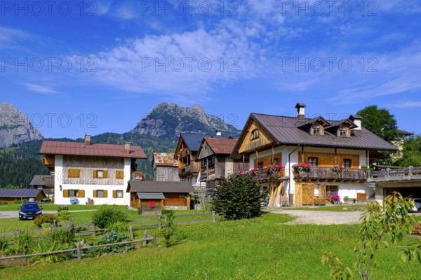Farms, district of Palu, Sappada, Plodn, behind the mountain Terza Piccola Monte Coston, Carnic Alps, Julian Friuli, Italy