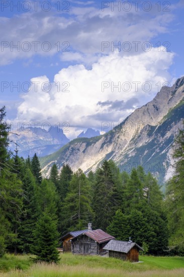 Alpine huts at Passo Cibiana, near Cibiana di Cadore, Dolomites, Trentino, Italy