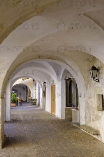 Arcades, archways in the old town centre, Neumarkt, Unteretsch, South Tyrol, Italy