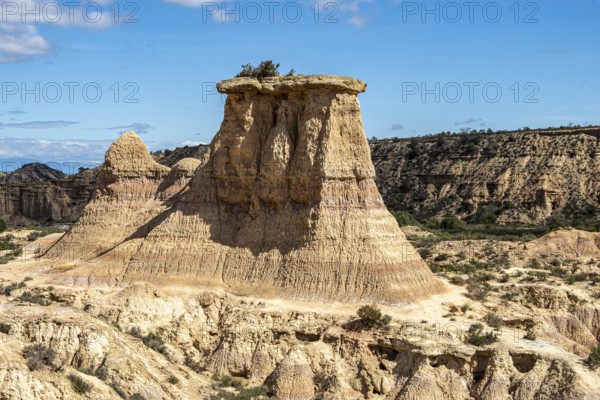 Tozal Solitario rock formation, desert, along gravel road Ruta Jubierre, Desierto de los Monegros, Spain