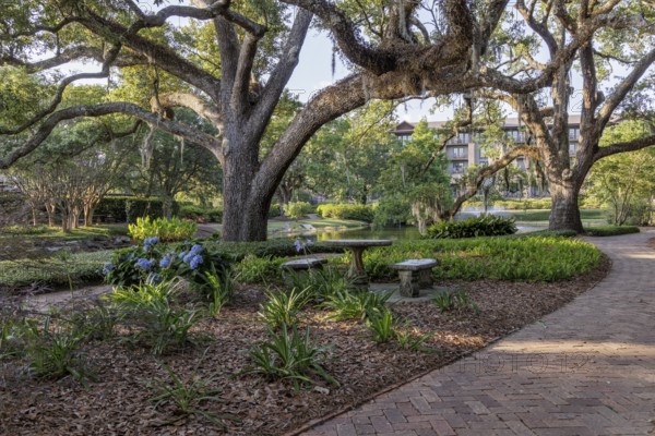 Walkway through lush gardens at Grand Hotel in Point Clear, Alabama