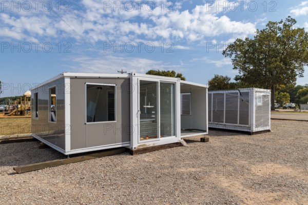 Foldable tiny house container kit home partially unfolded at Botel Campground near Savannah, Tennessee