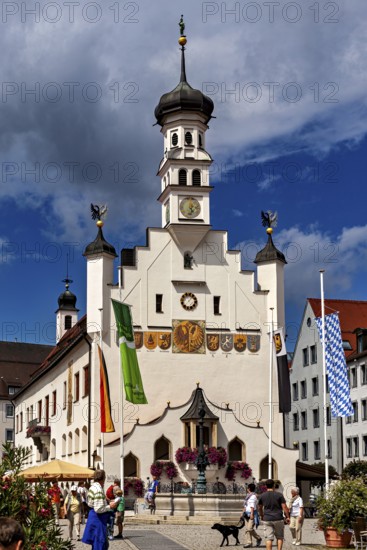Baroque town hall with people, flags and dog in the foreground, The town of Kempten im Allgäu