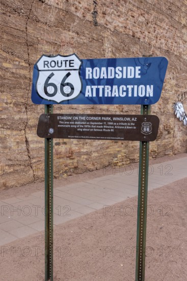 Roadside attraction sign at Standin' on the Corner Park in downtown Winslow, Arizona