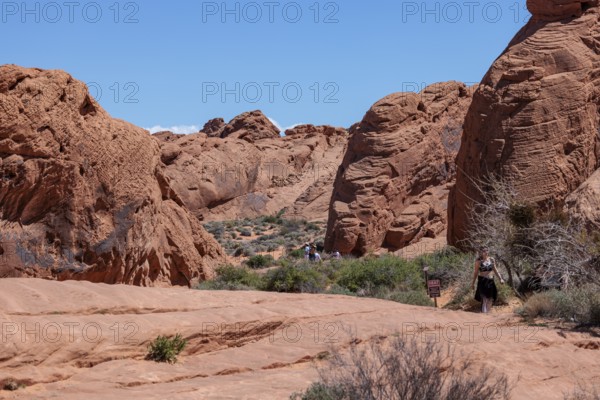 Sign at Fire Canyon Overlook Trailhead warns of hiking in hot weather at Valley of Fire State Park near Overton, Nevada