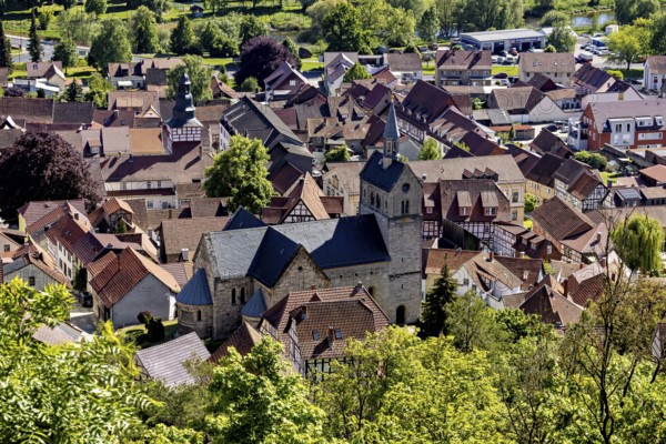 View of a picturesque village with old half-timbered houses and a central church in the countryside, The town of Treffurt in Thuringia