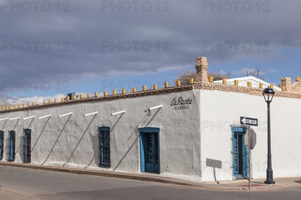 Territorial style adobe brick architecture of the La Posta de la Mesilla restaurant building in Mesilla, New Mexico