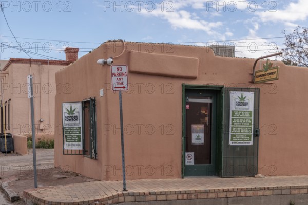 Pueblo style adobe architecture of a commercial cannabis dispensary in Mesilla, New Mexico
