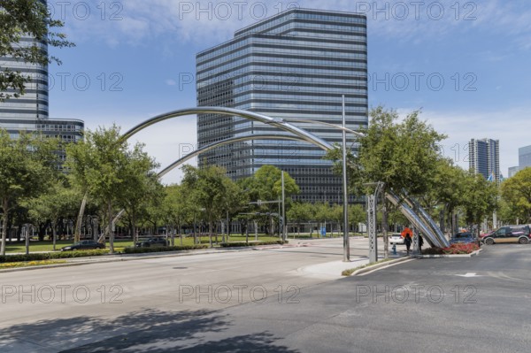Chrome plated steel arches cross Post Oak Boulevard in downtown Houston Texas