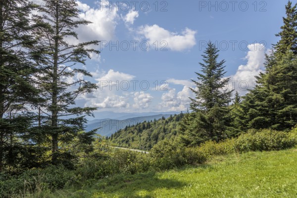 Smoky haze over the foliage on the mountainsides along the Blue Ridge Parkway in the Smoky Mountains near Cherokee, North Carolina, USA