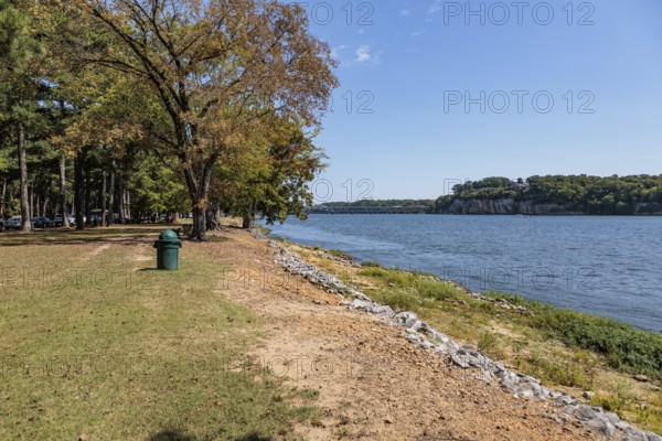 Tennessee River flows past McFarland Park and Recreation area in Florence, Alabama, USA