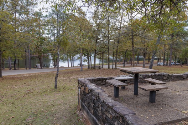 Picnic area overlooking Ivy Lake at Clarko State Park near Quitman, Mississippi, USA