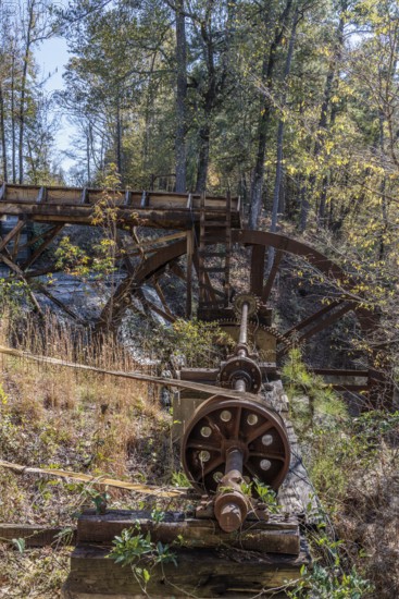 Hardware to convert energy from water wheel to gristmill and cotton mill at Dunn's Falls Park near Enterprise, Mississippi, USA