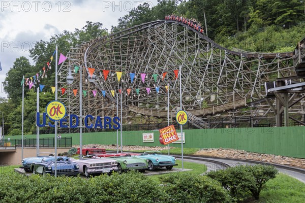 Lightning Rod roller coaster behind replica cars of the Rockin' Roadway ride at the Dollywood amusement park in Pigeon Forge, TN