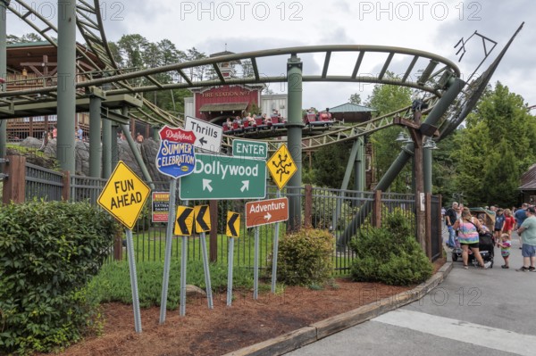 Road sign display for the Summer Celebrationin front of the FireChaser roller coaster ride in the Dollywood amusement park in Pigeon Forge, TN