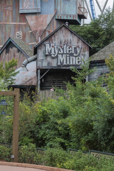 Sign on the building near the entrance to the Mystery Mine roller coaster ride at the Dollywood amusement park in Pigeon Forge, TN