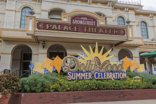 Groups of guests get photos taken in front of the Showstreet Palace Theater at the Dollywood amusement park in Pigeon Forge, TN