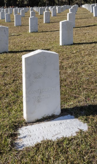 Headstones of many unknown confederate soldiers at the Enterprise Confederate Cemetery in Enterprise, Mississippi, USA