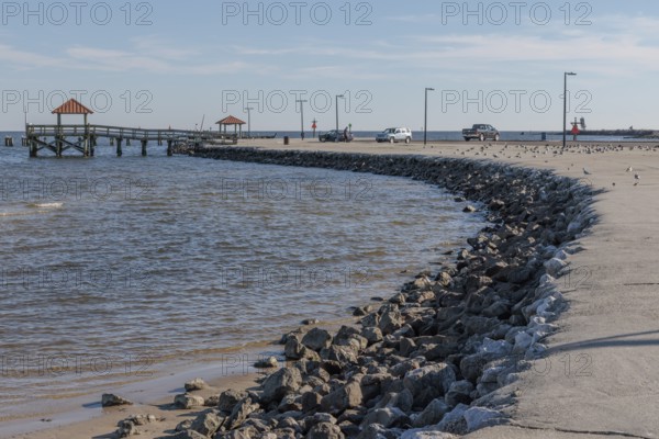 Concrete riprap along the parking area of the fishing pier at Courthouse Road on US Highway 90 in Gulfport Mississippi, USA