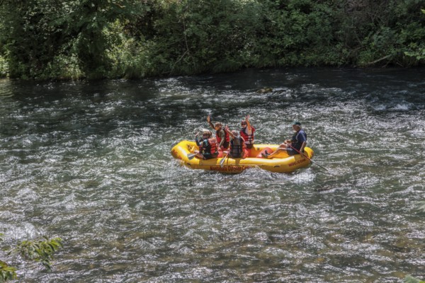 Rafters on the Nantahala River as seen from the Great Smoky Mountains Railroad which runs next to the river during its excursion from Bryson City, North Carolina