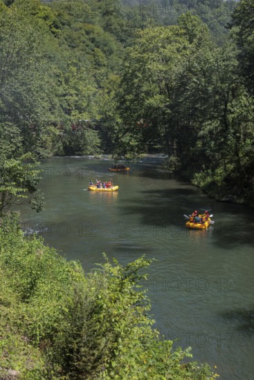 Rafters on the Nantahala River as seen from the Great Smoky Mountains Railroad which runs next to the river during its excursion from Bryson City, North Carolina