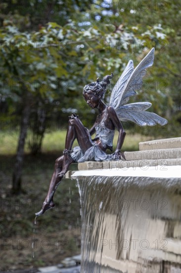 Fairy sculpture on a stone fountain near the entrance to Dismals Canyon near Phil Campbell, Alabama, USA