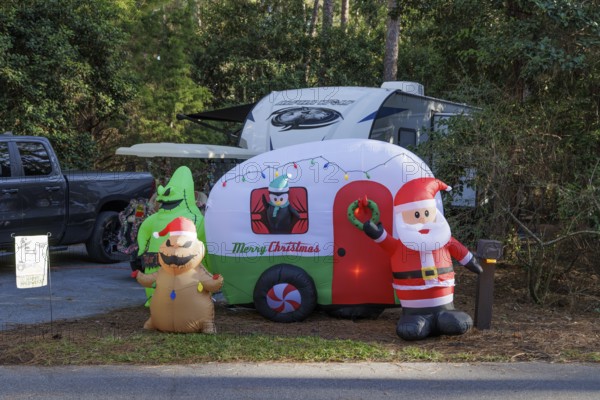 Inflatable Christmas and Halloween decorations at a campsite in Fort Wilderness campground at Walt Disney World in Orlando, Florida