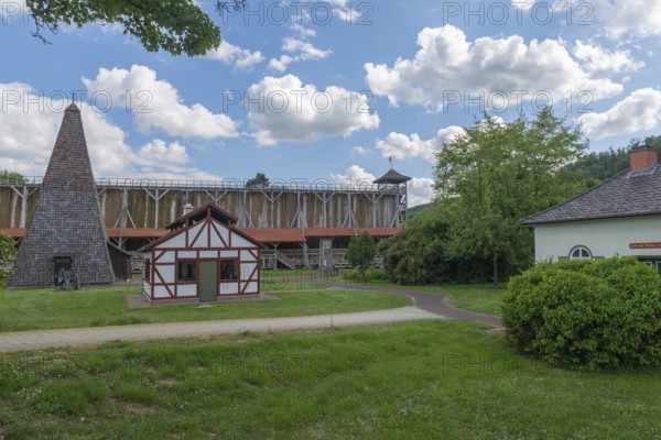 1000 years of salt production in Bad Sooden, Allendorf, district of Bad Sooden, town history, historical landmark graduation house from 1638, wooden construction, 140 metres long, 12 metres high, open-air inhalatorium, blackthorn, boiling dung or boiling house to increase the salt concentration in the water, brine air, aerosols, respiratory tract healing, therapy, white gold, brine, salt production process, blue sky, Werra-Meissner district, Hesse, Germany