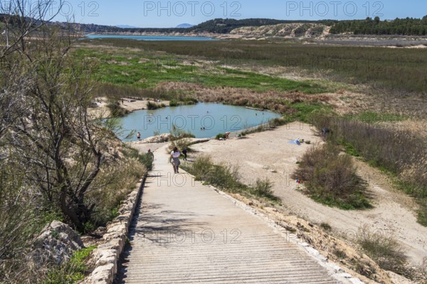People take a bath, natural hot springs Banos de Zujar, near artificial lake Embalse de Negratin, Andalusia, Spain