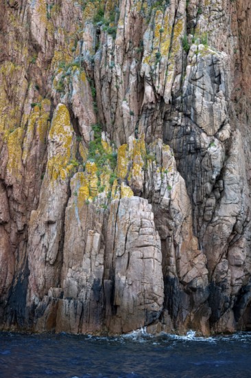 Rock formations and deep blue water, Capo Rosso, Gulf of Porto, Corsica, Corsica, France