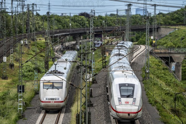 ICE 2, left, ICE 4 train on the line between Bochum and Dortmund, near Dortmund-Marten, multi-lane line for local and long-distance traffic, Dortmund, North Rhine-Westphalia, Germany