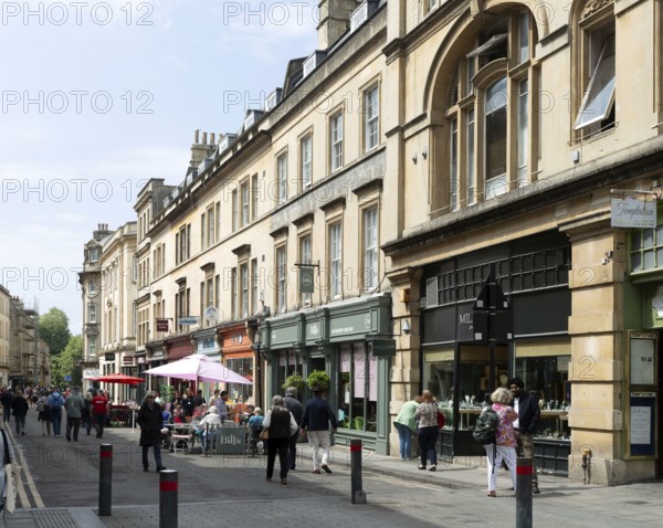 Shops in pedestrianised Cheap Street in city centre of Bath, north east Somerset, England, UK