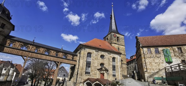 The Protestant-Lutheran St Laurentius Church with the bridge leading to the castle in Thurnau, Kulmbach district, Upper Franconia, Bavaria, Germany