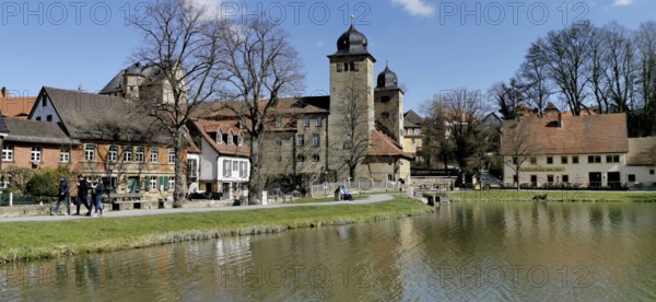 Thurnau Castle and the castle pond in early spring, Thurnau, Kulmbach district, Upper Franconia, Bavaria, Germany