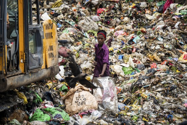 Garbage collectors searching for recyclable material at garbage disposal site, in Assam, India on June 4, 2025. World Environment Day, celebrated every year on June 5, was established by the United Nations in 1972 to raise awareness and inspire action for protecting the environment. It highlights urgent issues like pollution, climate change, and biodiversity loss, encouraging individuals, communities, and governments to take steps toward a more sustainable future
