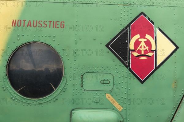 Schifflersgrund border museum memorial on the former border between the FRG and the GDR, Soviet multi-purpose helicopter, type MIL MI 8, for surveillance and reconnaissance flights, detail with mmer and compass, GDR coat of arms, porthole, emergency exit and Bad Sooden-Allendorf, Hesse, Asbach-Sickenberg Thuringia, Germany