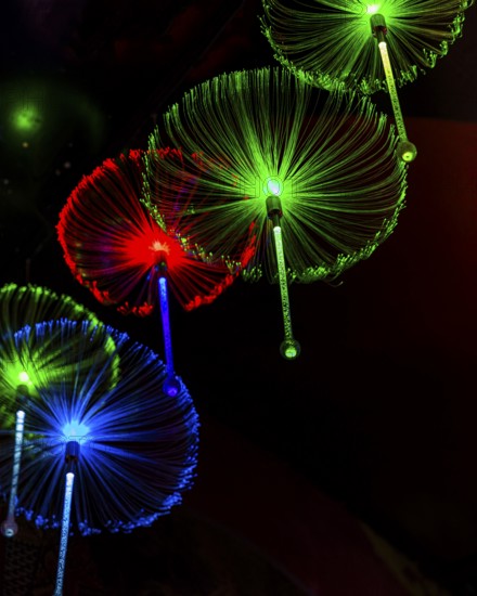 Green, blue and red glass thread lights, Wat Phra That Sorn Kaew Buddhist temple complex, Phetchabun province, Thailand