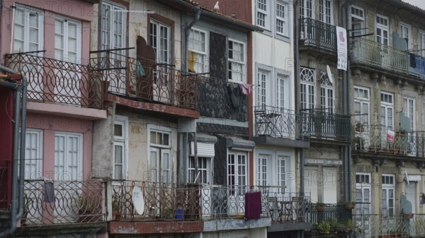 Row of old town houses with colorful facades and balconies, Porto, Portugal