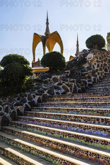 Staircase decorated with colorful mosaic tiles, Buddhist temple complex Wat Phra That Sorn Kaew, Phetchabun province, Thailand