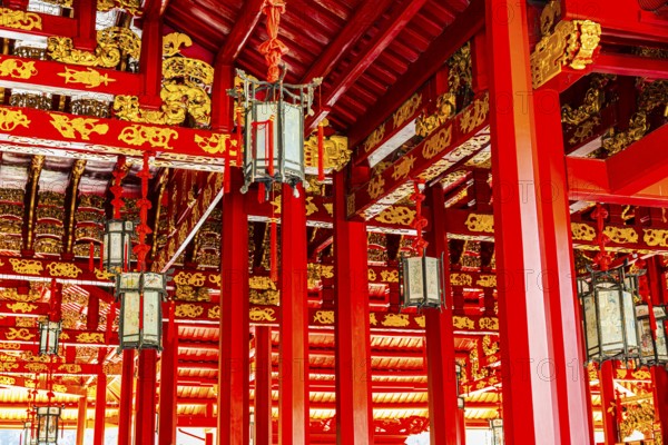 Roof structure with red beams and golden decorations, Wehat-Chamrun Residence, Thai King's Summer Palace, Bang Pa-In, near Ayutthaya, Thailand