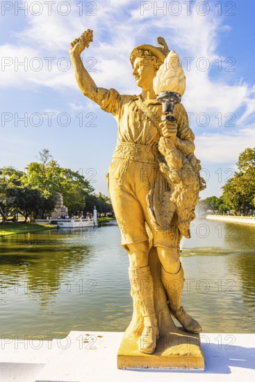 Stone male figure in alpine traditional costume, Thai King's summer palace, Bang Pa-In, near Ayutthaya, Thailand