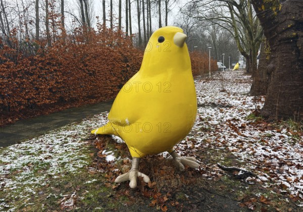 Very large yellow canary by Axel Hummert and his employee Silke Tinnefeld, Designallee from Zollverein-Nord railway station to the UNESCO World Heritage Site Zollverein, Essen