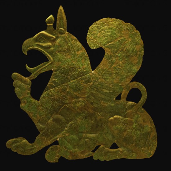 Monumental bronze sheet, griffin suckling her cub, golden sculpture of a griffin with wings, a fantasy creature from ancient times, Olympia Archaeological Museum, Ancient Olympia, Olympia, Peloponnese, Greece