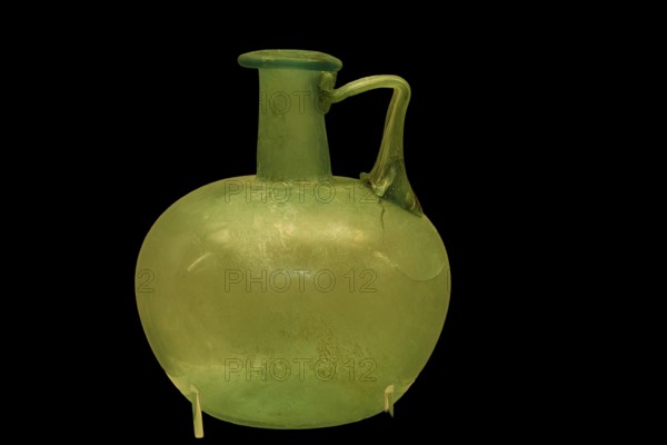 Ancient green glass vase with round body and narrow handle, Olympia Archaeological Museum, Ancient Olympia, Peloponnese, Greece