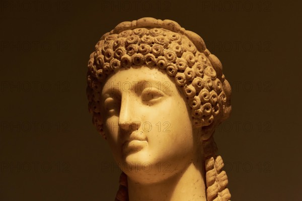 Marble head of Poppaea Sabina, second woman of Roman Emperor Nero, antique marble head of a woman with detailed hairwork, Olympia Archaeological Museum, Ancient Olympia, Olympia, Peloponnese, Greece