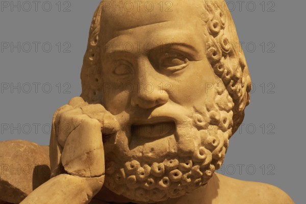 Head of the statue of the Seer, east pediment of the Temple of Zeus, preparations for the chariot race between Pelops and Oinomaos, stone figure of a thoughtful man, Olympia Archaeological Museum, Ancient Olympia, Peloponnese, Greece